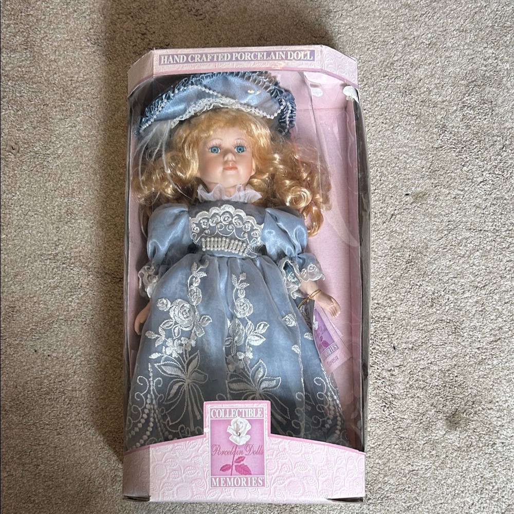 Collectible Porcelain Doll in Lace Blue Dress